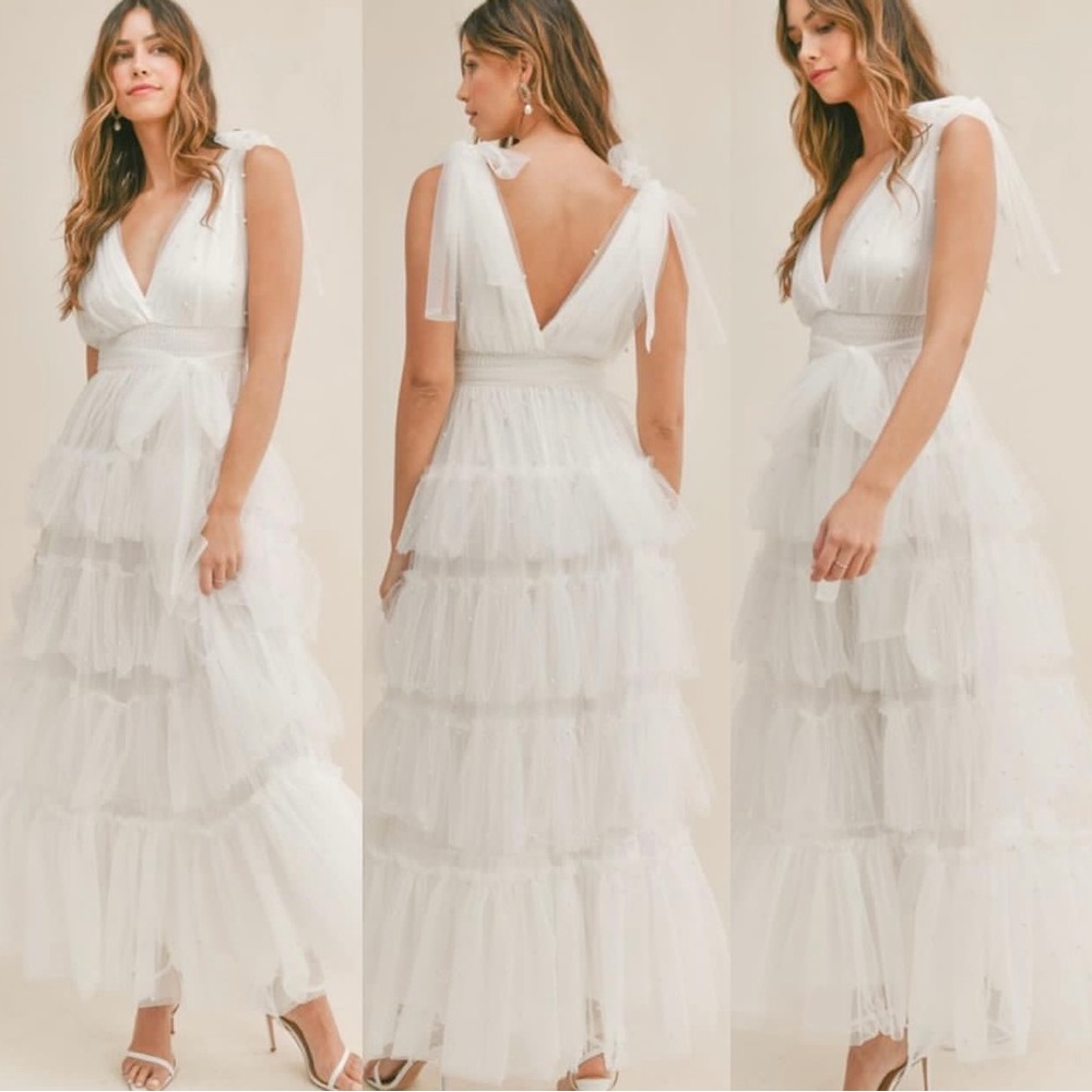 BRIDAL DRESS— white dress SO cute. It has pearls all over.